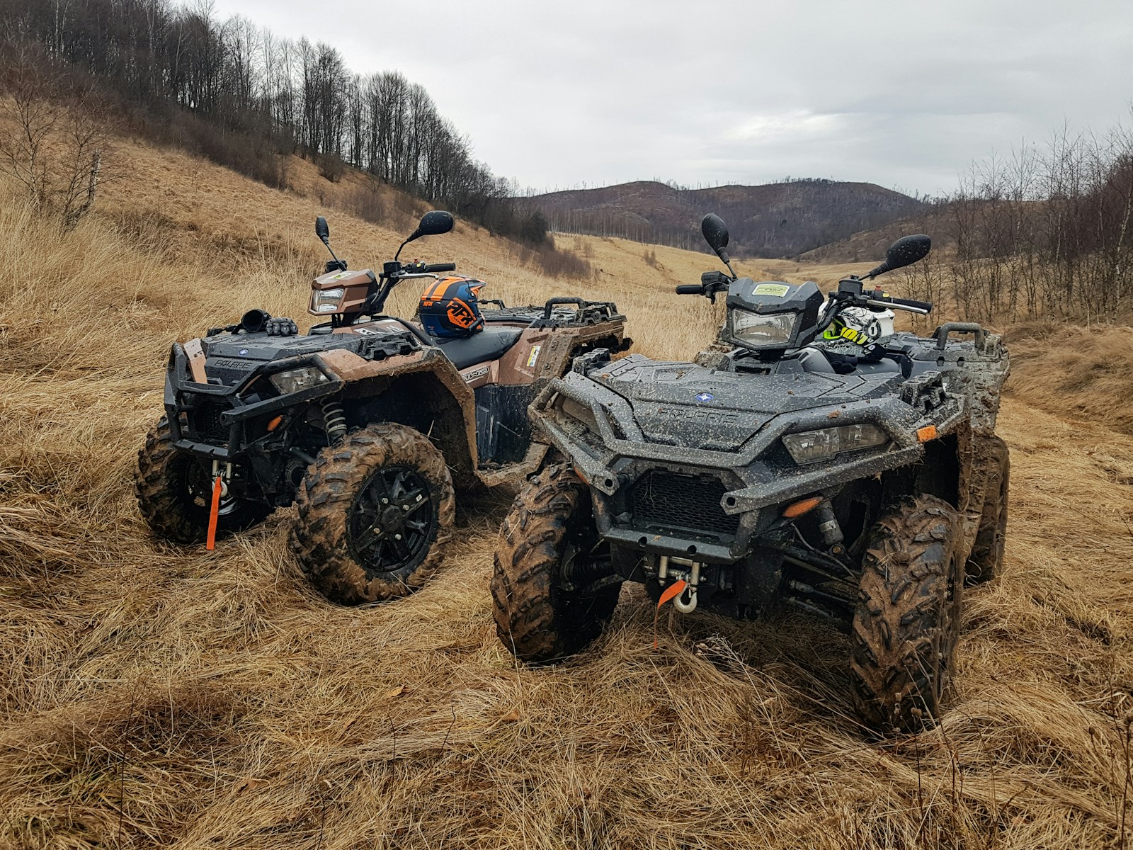 black and gray atv on brown field during daytime, powersports vehicle